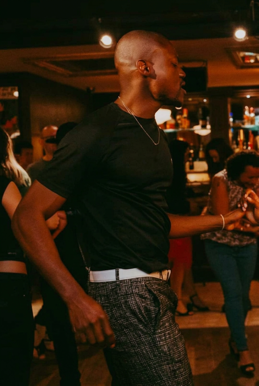 Salsa dancer with braids on the dance floor
